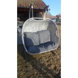 A Bramblecrest Monterey All Weather Wicker Double Hanging Cocoon in Dove Grey Coloured Weave