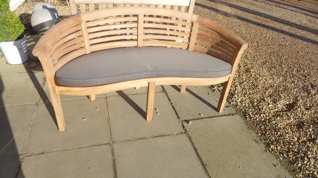 A Bramblecrest Pimlico Teak Banana Bench