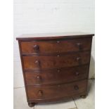 A restored 19th century mahogany bow fronted four drawer chest on turned feet - Height 101cm x