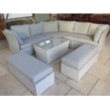 A Bramblecrest all weather garden corner sofa with a coffee table and two stools