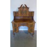 A good 19th century walnut North European desk with an up stand having four small drawers and a