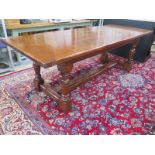 A good quality solid oak refectory table probably by Belvedere of Ipswich - Length 229cm x With 92cm