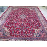 A hand knotted woolen Mahal rug - 4.28m x 3.12m