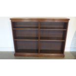 A Victorian walnut double bookcase with adjustable shelves with a nice patina - Width 152cm x Height