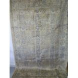 A hand knotted woolen fine mood rug - 2.95m x 2.00m