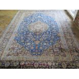 A hand knotted woolen Kashan rug - 3.30m x 2.36m