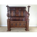 An impressive carved oak Elizabethan style four poster bed - maximum external measurements 183cm