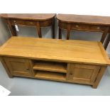 An ex display oak TV unit