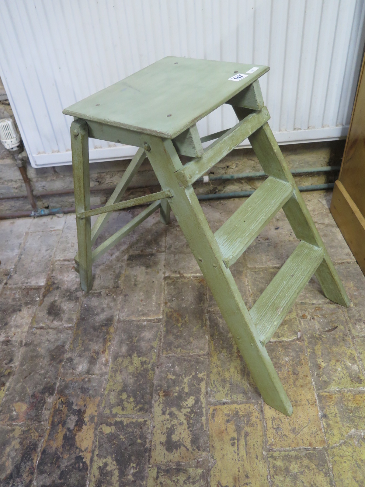 A shabby-chic painted 2-tread set of steps