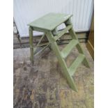 A shabby-chic painted 2-tread set of steps