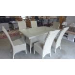 A Lloyd Loom rectangular dining table and six side chairs RRP £2,495