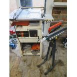 A Luna Z 40 electric woodworking machine with 2 roller stands