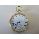 An 18ct yellow gold cased open faced pocket watch by W. Batty & Sons Ltd Manchester, white enamel