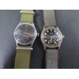 Two German WWII Military Manual Wind Wristwatches, Nisus and Helios, both working in saleroom,