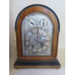 A German mantle clock, silvered dial with Roman numerals to chapter ring, adjustable movement with