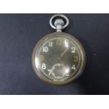 A Military top wind pocket watch - worn but working in the saleroom - Width 5cm