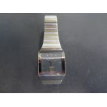 A gentleman's Rado Diastar wristwatch, black dial with baton markers, date aperture at 6 o'clock,