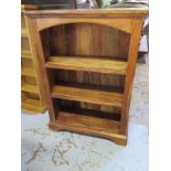A hardwood bookcase with fixed shelves - Height 114cm x 79cm x 32cm