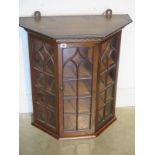 A mahogany wall cabinet with astragal glazed door - Height 71cm x 64cm