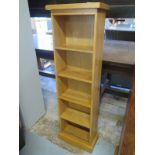 An oak CD rack - Height 116cm x 36cm x 18cm