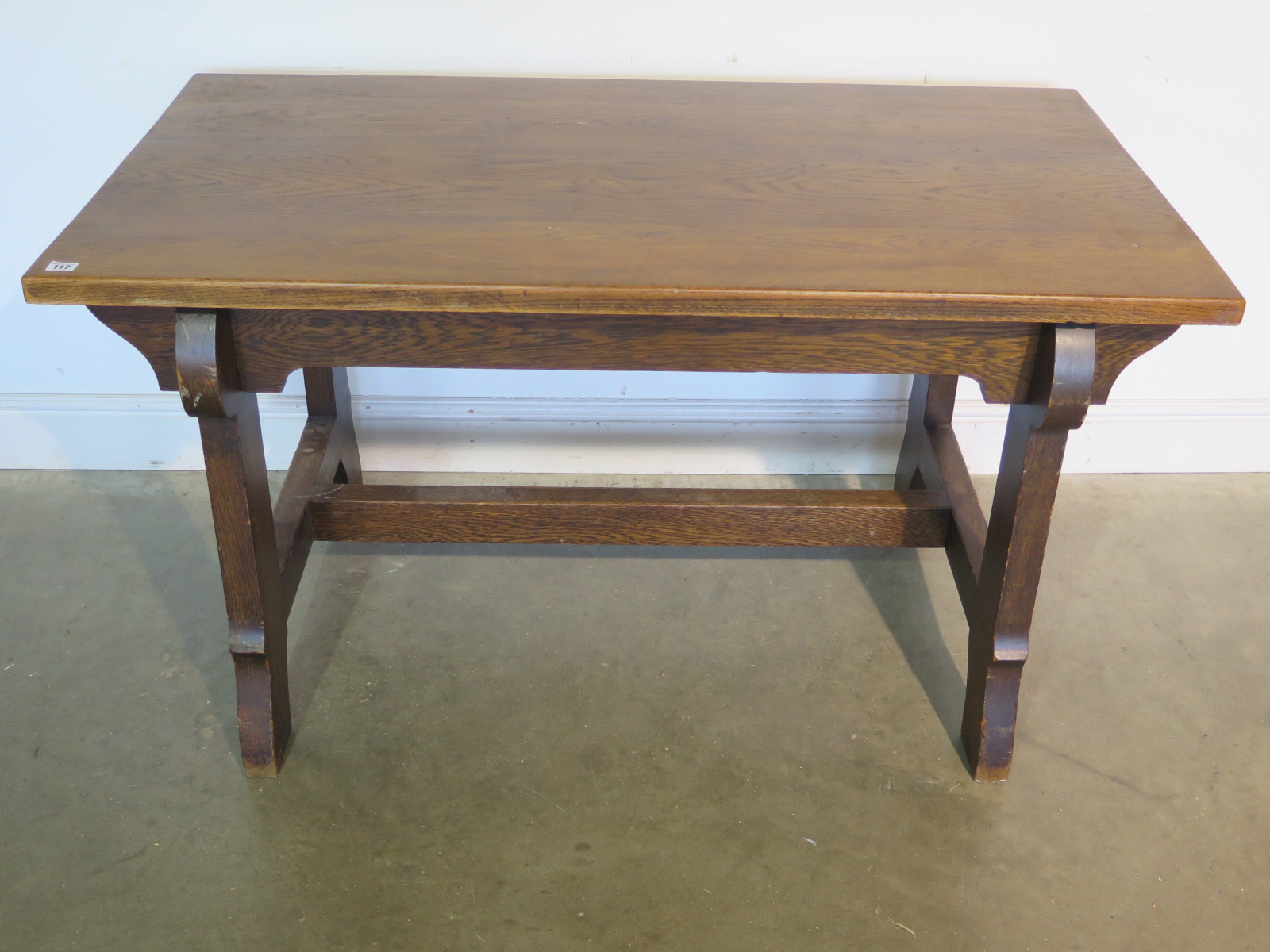 An oak Arts and Crafts refectory table - Height 75cm x 73cm x 135cm - removed from a Cambridge