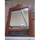 A hardwood mirror with metalwork detail - 98cm x 70cm