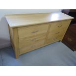 An oak six drawer sideboard - Height 76cm x 142cm x 43cm