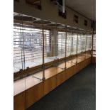 Three jewellery shop window show cases each measuring 15m long x 2.2m tall and two Epos till