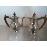 A Mappin and Webb silver teapot and water jug Birmingham 1926/27 - Height 14cm - approx total weight