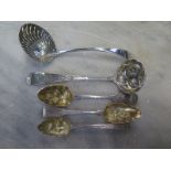 Three Georgian silver berry spoons, a berry ladle and a strainer spoon - approx weight 4.4 troy oz -