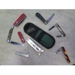 A selection of pocket penknives including Sheffield made knives, a fishing pen knife and a cased