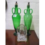 A pair of 19th century green glass twin handle bottles - Height 36cm - and a decorated vase of