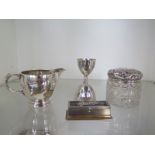 A silver jug, a silver top tidy, a plated measure and a plated stamp box with silver letters - total