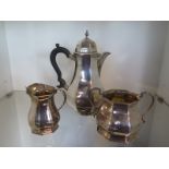 A silver coffee/water jug London 1869/70 CS & HS - approx weight 19.7 troy oz and a similar milk and