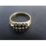 An 18ct yellow gold five stone diamond ring size L - approx weight 2.4 grams - very light usage wear