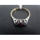 An 18ct yellow gold and platinum ruby and diamond ring size S/T - approx weight 2.1 grams - some