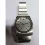 A Gents Omega Constellation Quarts wristwatch with a medium sized strap in working order with a day,