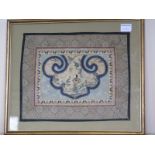 A Chinese silk embroidered sleeve part in a wooden frame - overall size 40cm x 34cm - good condition