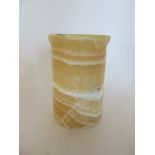 An Egyptian alabaster vessel - Height 12cm x Diameter 8cm - sound condition, repairs to top rim