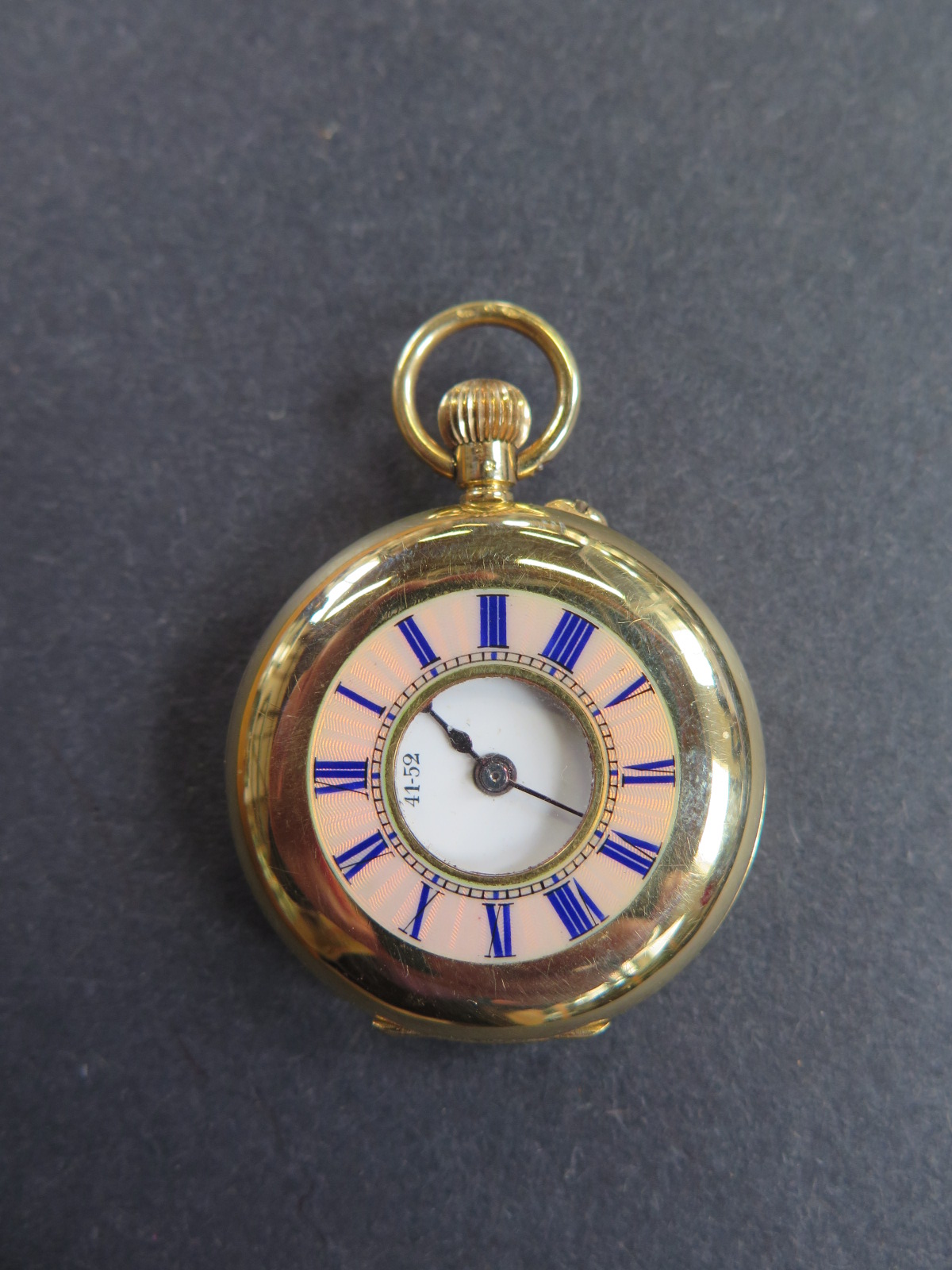 An 18ct yellow gold half hunter pocket watch - 35mm diameter, S Smith & Son with plated movement