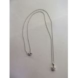 9ct white gold diamond pendant on 9ct white gold chain - total diamond weight approx 0.25ct - with