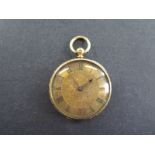 A small 18ct yellow gold pocket watch - 35mm diameter with plated dust cover - total weight approx