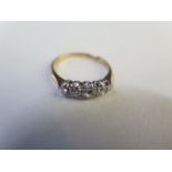 An 18ct hallmarked five stone diamond ring - size L/M approx 2 grams - central diamond approx 0.20ct