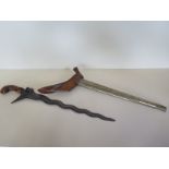 A good Kris with well carved handle and decorated sheath blade length 37cm - total length in