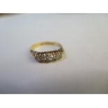 An 18ct yellow gold hallmarked five stone ring - size O/P - approx 3.8 grams - diamonds bright -