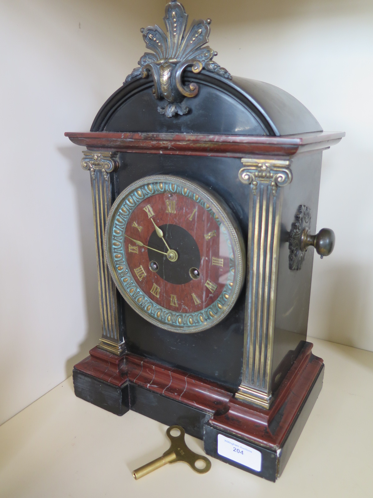 A 19th Century french slate marble mantle clock in working order with key