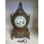 An Ormolu mounted French Boulle mantle clock - white enamel dial with roman numerals - approx 31cm