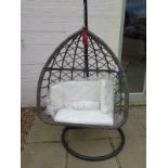 A Garden Egg Chair with cushions in as new condition