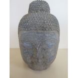 A carved stone Siamese head, 17cm tall - overall good condition