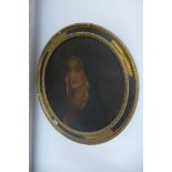 An oil on canvas of the Madonna - Diameter 49cm - in a gilt frame - no obvious damage, some losses